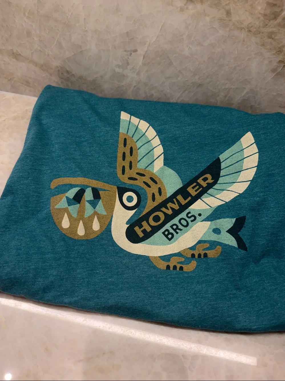 Howler Brothers Teal Throw with Multicolor Pelican Graphic